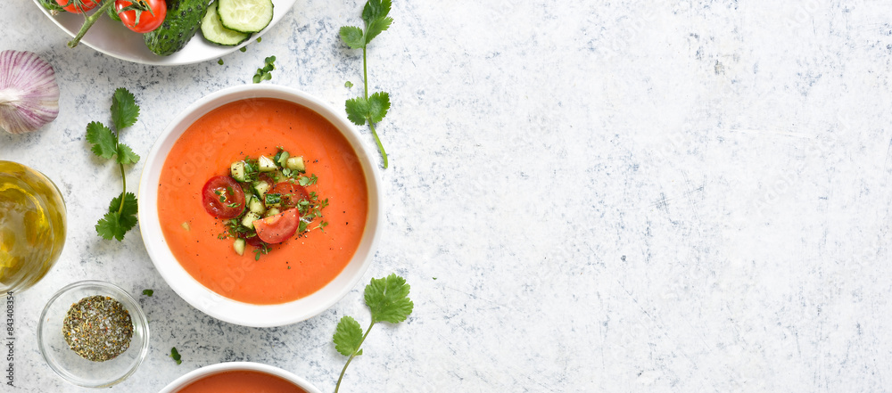 Gazpacho soup in bowl over light stone background with free text space Gazpacho soup in bowl over light stone background with free text space