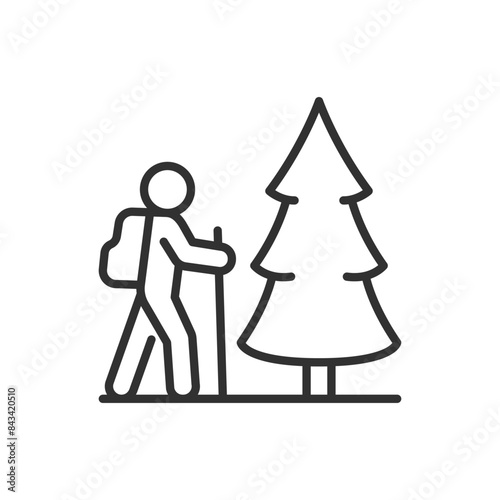 Hiking, linear icon. A hike in the nature. A person with a cane walking in the forest. Line with editable stroke