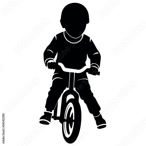 Little boy rides a bicycle vector  silhouette, front side view