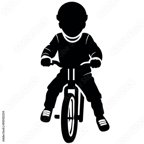 Little boy rides a bicycle vector  silhouette, front side view