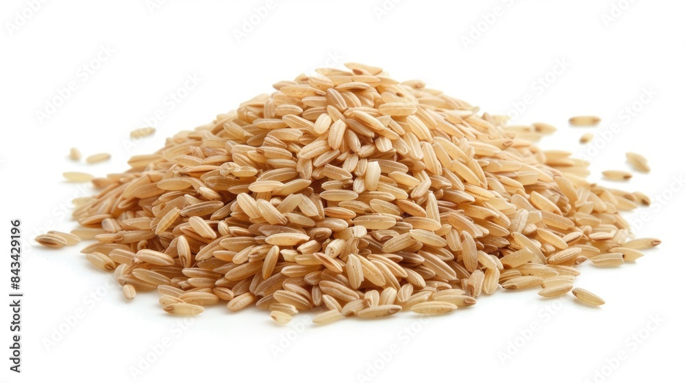 Heap of brown rice on a white backdrop Heap of brown rice on a white backdrop