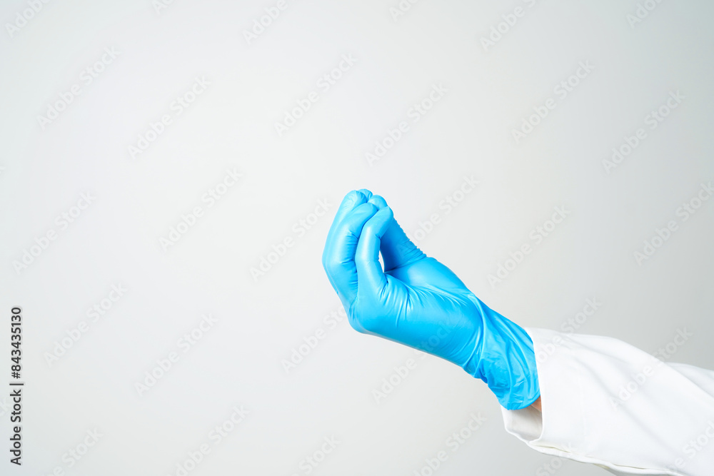 hand gestures or signs in blue disposable latex surgical gloves isolated hand gestures or signs in blue disposable latex surgical gloves isolated