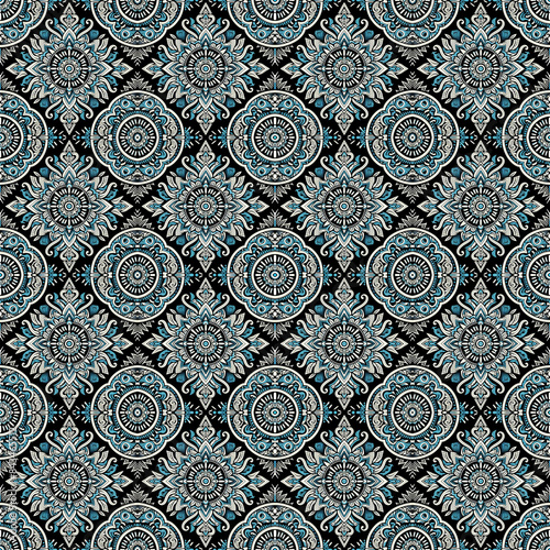 Aztec seamless pattern with light blue and white on a black background