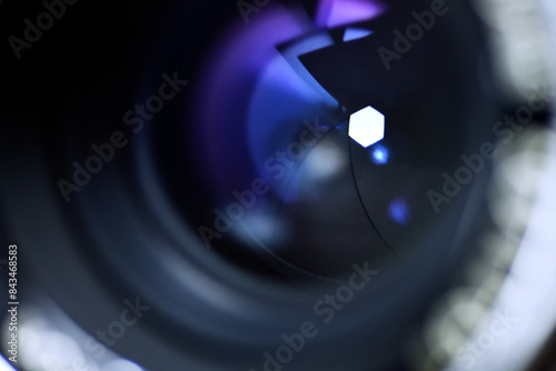 close up of the lens surface and it's aperture blade inside. photo