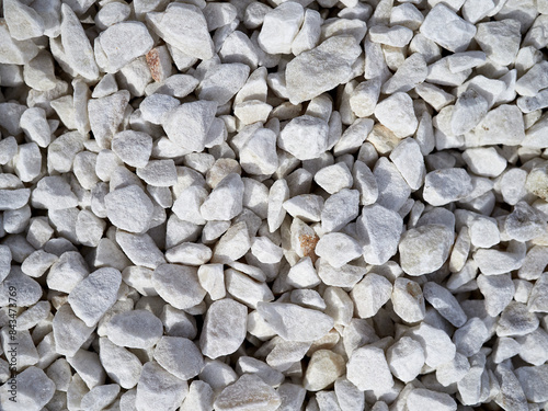 Texture of white decorative stones. White gravel