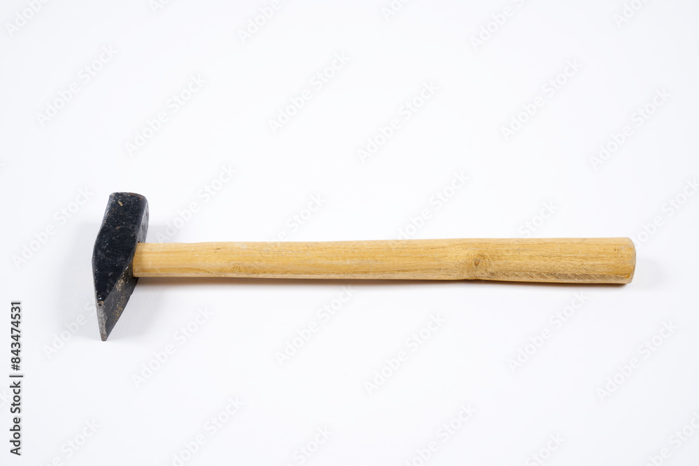 Carpenter hammer with wooden handle on an isolated white background. Carpenter hammer with wooden handle on an isolated white background.