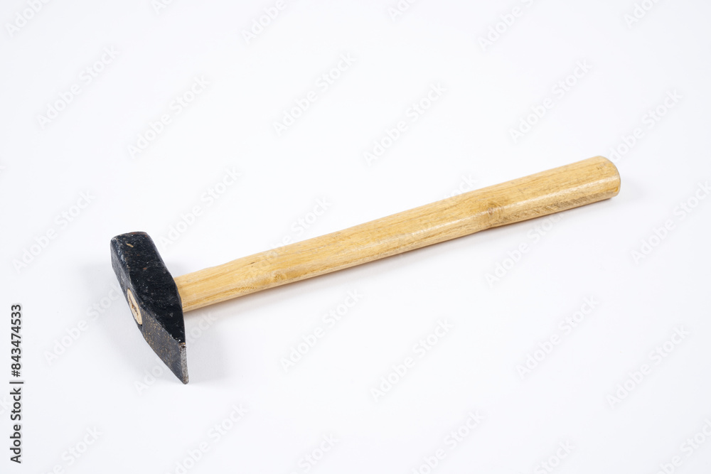 Carpenter hammer with wooden handle on an isolated white background. Carpenter hammer with wooden handle on an isolated white background.