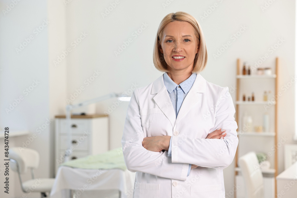 Portrait of happy dermatologist in modern clinic Portrait of happy dermatologist in modern clinic