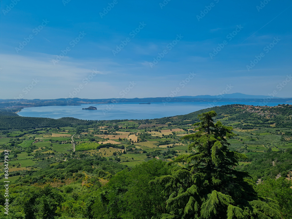 Fototapeta premium view from the top of the hill, lake and fields