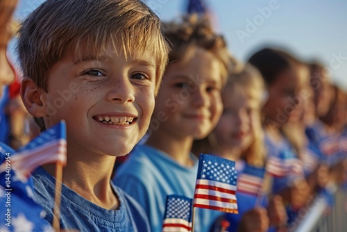 Family enjoying a freedom celebration with children holding small American flags near a flagpole photo