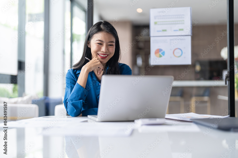Beautiful Business Woman working by using laptop computer Hands typing on keyboard. Professional investor working new start up project. business planning in office. Technology business Beautiful Business Woman working by using laptop computer Hands typing on keyboard. Professional investor working new start up project. business planning in office. Technology business
