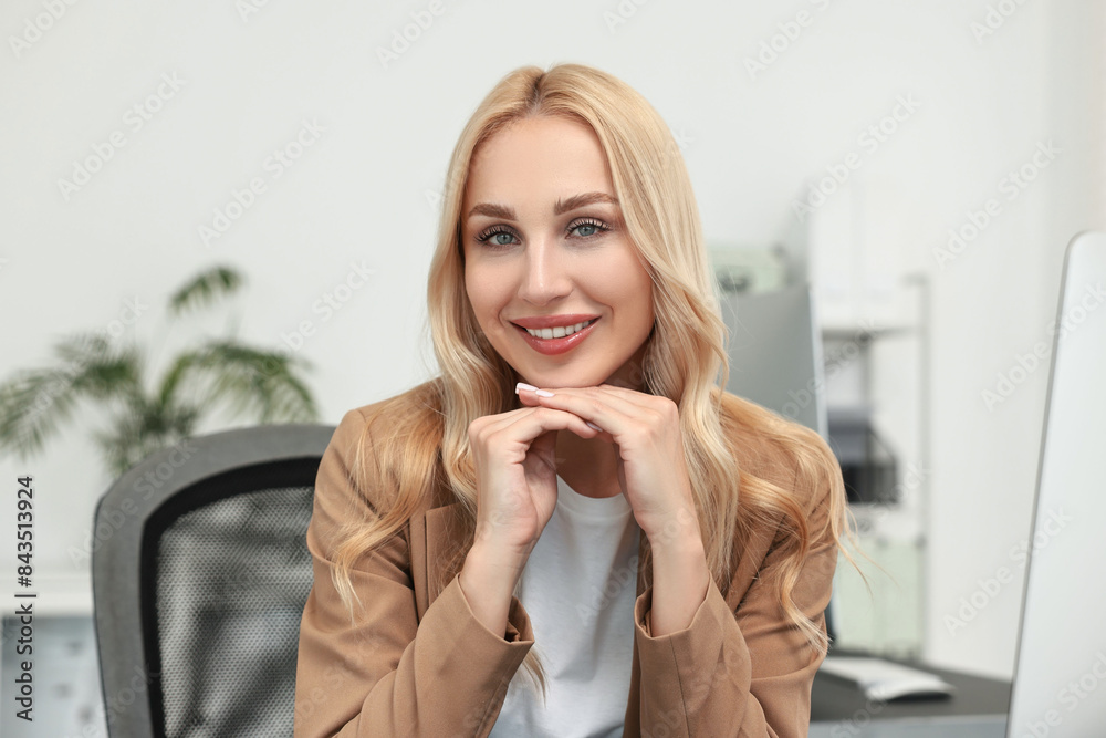 Portrait of happy beautiful secretary in office Portrait of happy beautiful secretary in office