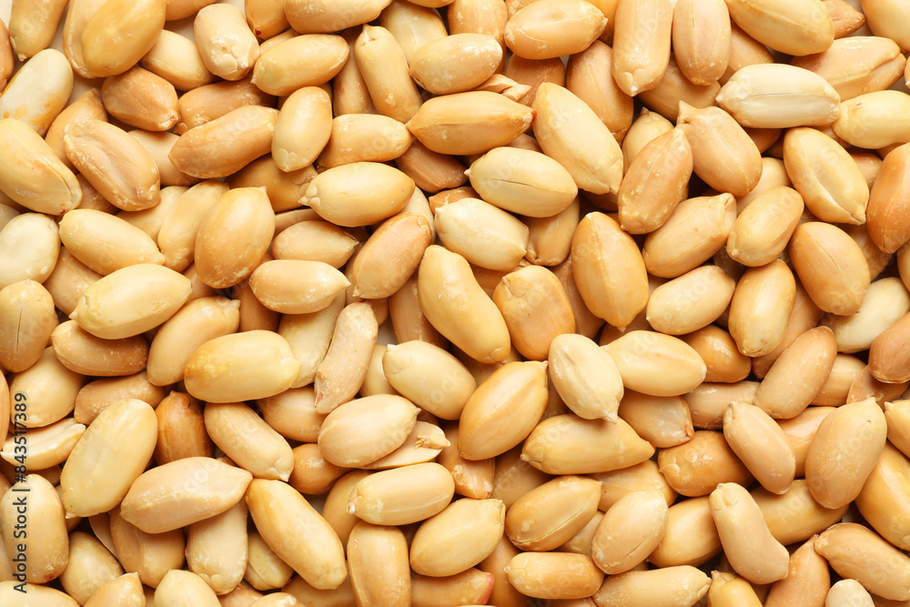 Fresh peeled peanuts as background, top view Fresh peeled peanuts as background, top view