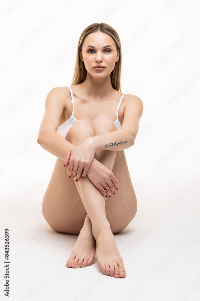 Perfect slim toned young body of the girl plastic surgery and aesthetic cosmetology concept. Perfect slim toned young body of the girl plastic surgery and aesthetic cosmetology concept.