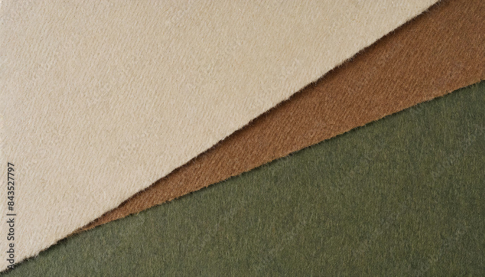 Fototapeta premium Handmade paper texture with beige, brown and green, coarse fibers, speckles, a rough torn edge, rustic, artistic projects.