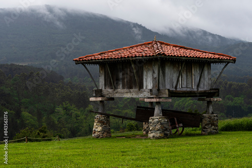 Photograph of a traditional horreo to store grain typical of northern Spain. Located in the Hermitage of the Regalina, Spain. photo