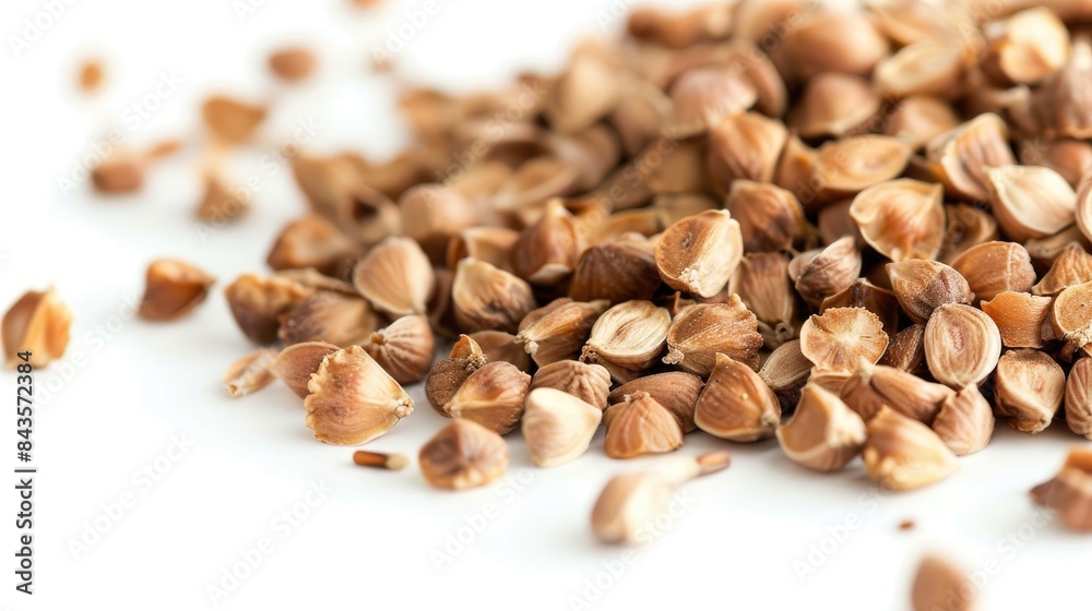 Buckwheat seeds close up on white background Buckwheat seeds close up on white background