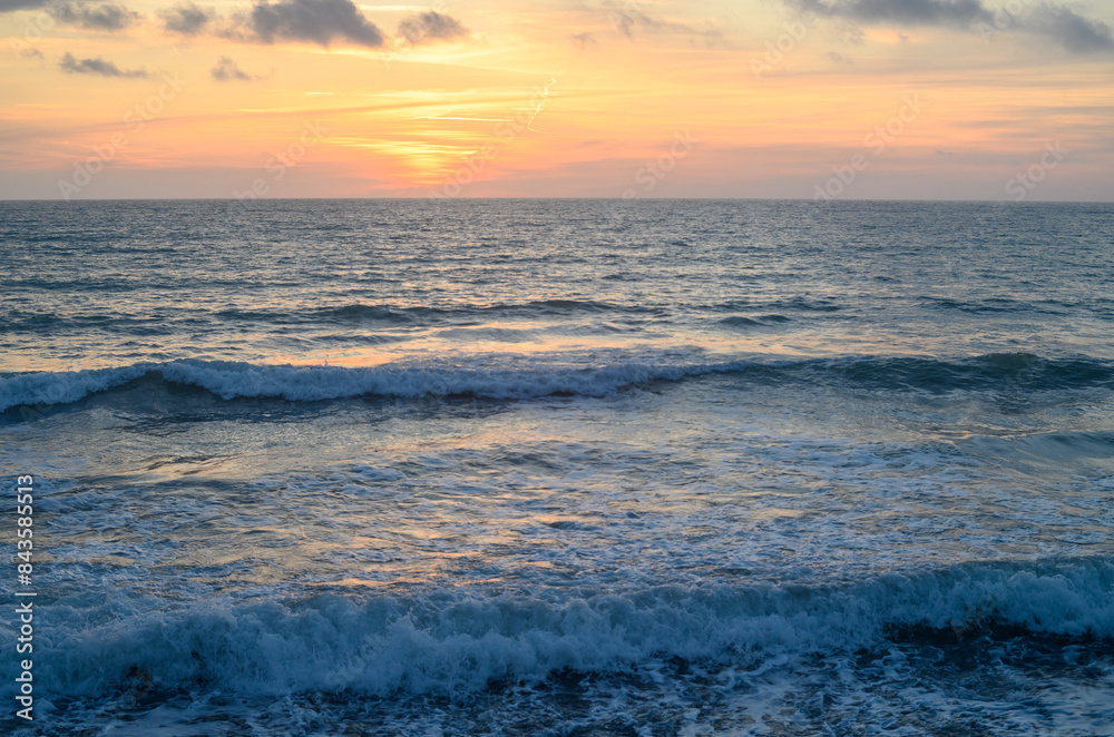 Warm waves of the Mediterranean sea and a sandy beach at sunrise 1 Warm waves of the Mediterranean sea and a sandy beach at sunrise 1