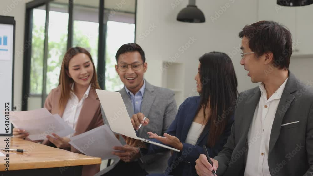 Team of Asian business people and working together in office, Startup projects and business presentation. Team of Asian business people and working together in office, Startup projects and business presentation.