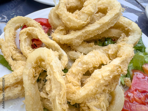 deep fried calamari rings, seafood on palte photo