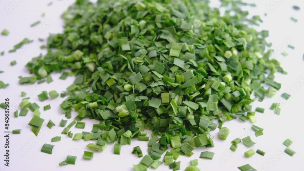 Chopped fresh ripe scallion and garlic on white background. Ingredient salsa Chopped fresh ripe scallion and garlic on white background. Ingredient salsa