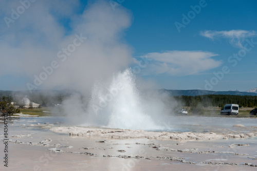 Eruption of the Great Fountain Geyser in Yellowstone National park. photo