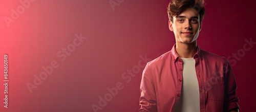 A young man in casual clothes featured in a lifestyle image with copy space