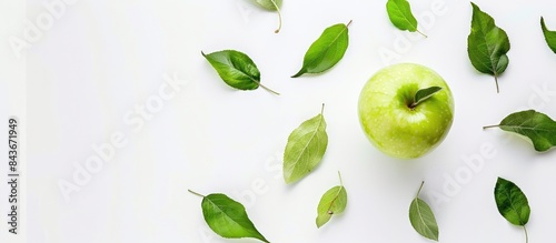 Wallpaper Mural Green apple with green leaves isolated on a white background, viewed from above. Torontodigital.ca