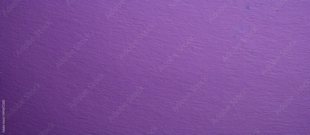 Fototapeta premium Close up image of a textured purple paper background with space for copying