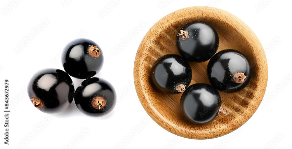 Black currant fruit without leaves and twigs on a wooden tiny platter. Close-up on the detail. Black currant fruit without leaves and twigs on a wooden tiny platter. Close-up on the detail.
