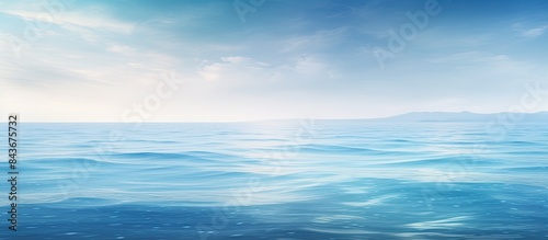 A serene abstract view of the ocean s tranquil surface in the early morning offering ample copy space for creative use