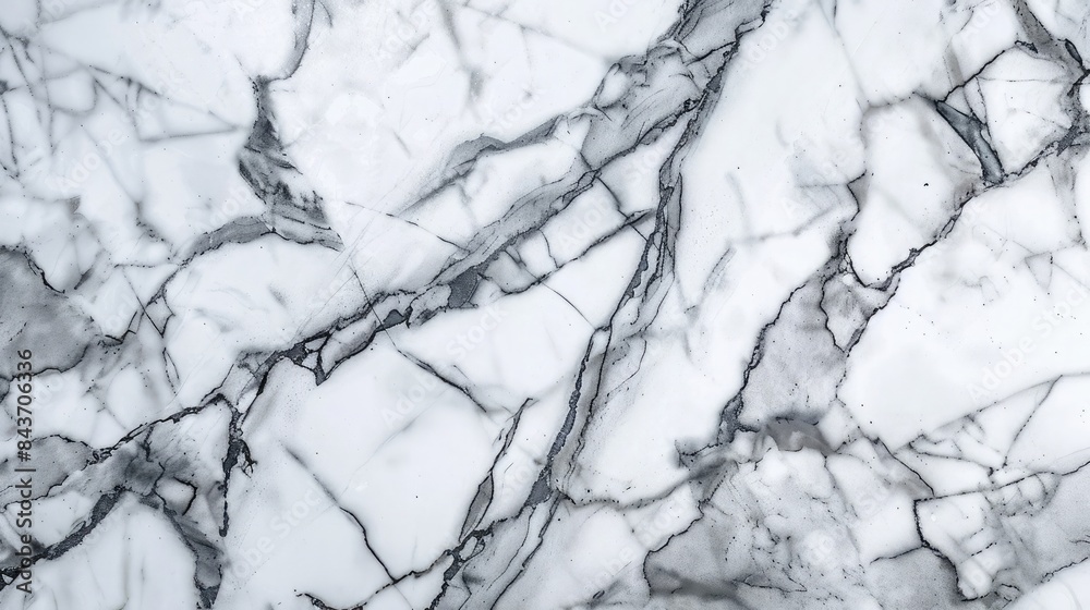 Close-up of marble with intricate gray veining on a polished white surface Close-up of marble with intricate gray veining on a polished white surface