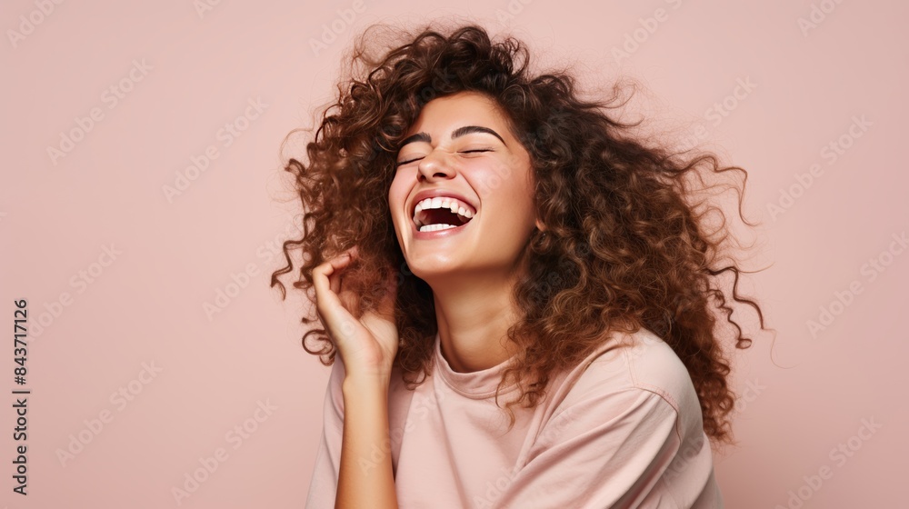 A candid moment of a teenage girl giggling with delight as she shares a funny meme with her friends on her mobile phone, their shared laughter filling the air. A candid moment of a teenage girl giggling with delight as she shares a funny meme with her friends on her mobile phone, their shared laughter filling the air.