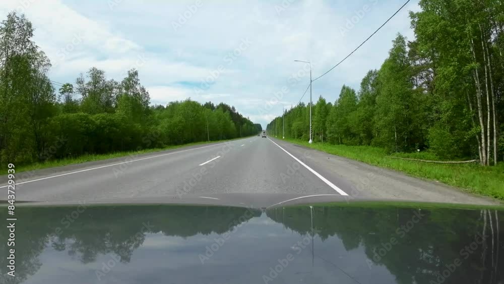 FPV view from car of driving along a country highway in forest in summer. 4K FPV view from car of driving along a country highway in forest in summer. 4K