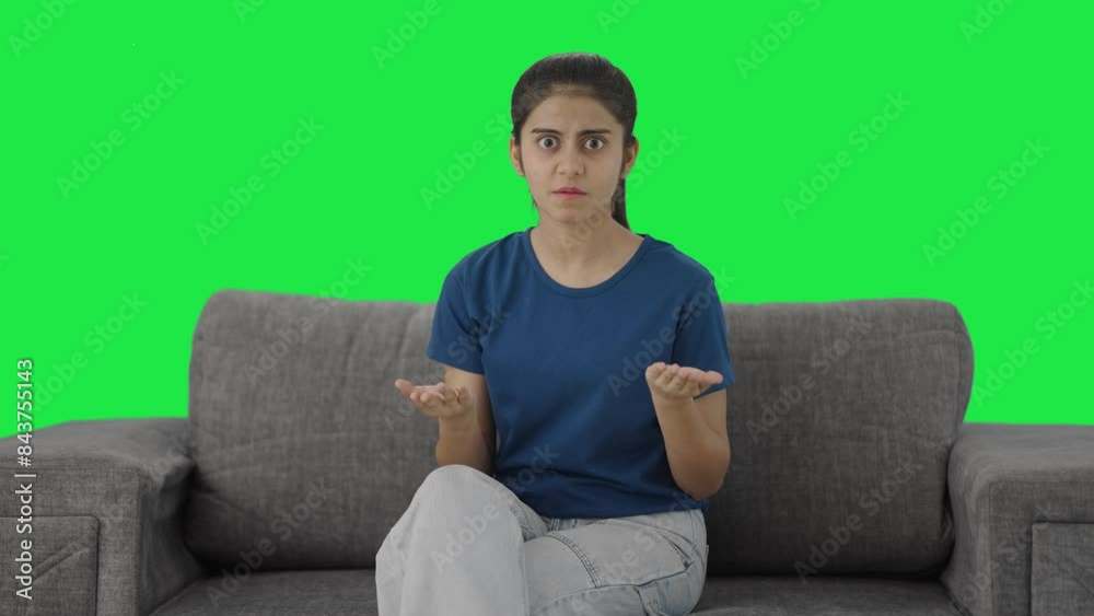 Indian teenage girl shouting on the camera Green screen Indian teenage girl shouting on the camera Green screen