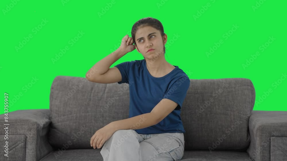 Confused Indian teenage girl thinking about something Green screen Confused Indian teenage girl thinking about something Green screen