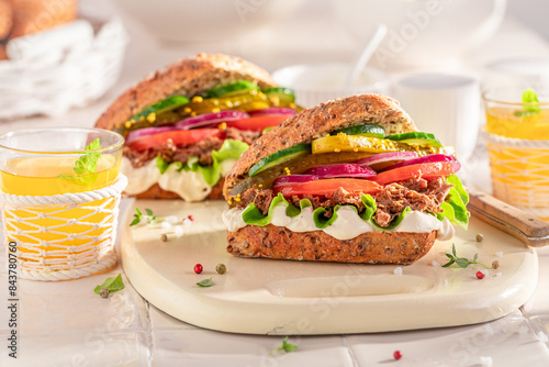 Homemade sandwich made of vegetables and beef.