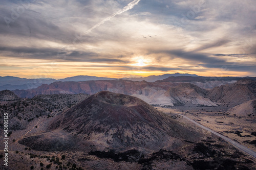Diamond Valley near St. George Utah with cinder cone volcano at sunset. photo
