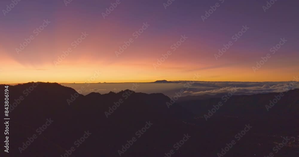 Aerial view the first light shine on Bromo volcano group.
Amazing View from the top of the mountain of King Kong hill viewpoint to see Mount Bromo constantly spewing white smoke from its crater. Aerial view the first light shine on Bromo volcano group.
Amazing View from the top of the mountain of King Kong hill viewpoint to see Mount Bromo constantly spewing white smoke from its crater.