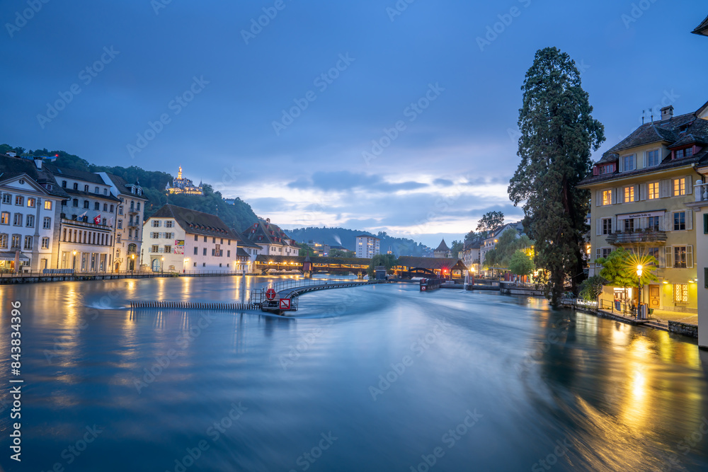 Naklejka premium Night view of chapel bridge ,jesuitenkirche in old town are very famous and beautiful landscape in Luzern Switzerland 