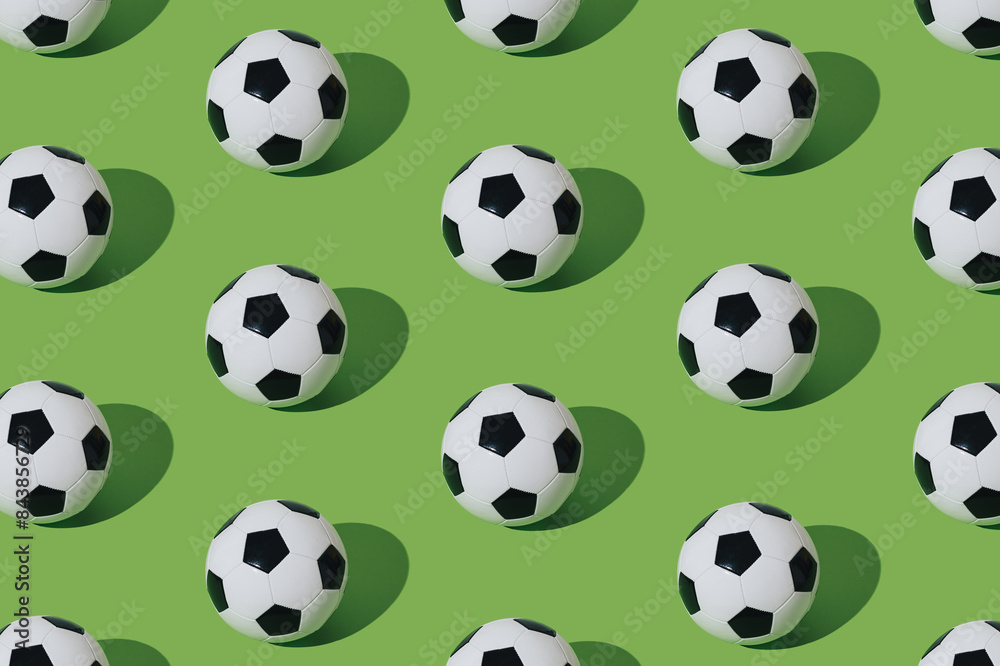 Trendy football pattern composition on light green background. Minimal sport concept. Creative football or soccer pattern idea. Football aesthetic background. Trendy football pattern composition on light green background. Minimal sport concept. Creative football or soccer pattern idea. Football aesthetic background.