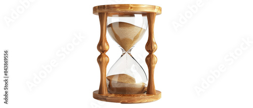 Wooden hourglass with sand running through. photo