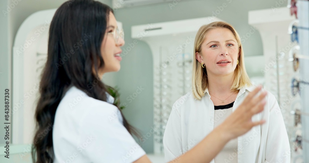 Choice, optometrist and help customer with glasses for eye health, wellness or care of doctor. Ophthalmology, lens frame and woman assist client for advice, spectacles or eyesight correction at store Choice, optometrist and help customer with glasses for eye health, wellness or care of doctor. Ophthalmology, lens frame and woman assist client for advice, spectacles or eyesight correction at store