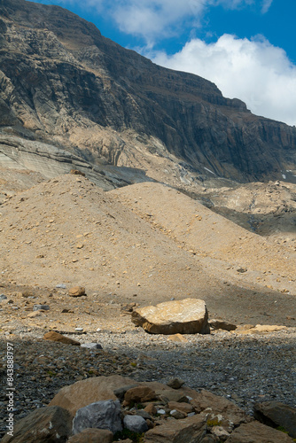 erratic stone blocks left by the action of a receding glacier photo