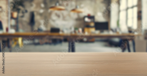 Wallpaper Mural Empty wooden table in blurred office background. Spacious wooden desk in a blurred office interior, ideal for product placement or presentations with a professional atmosphere. Torontodigital.ca