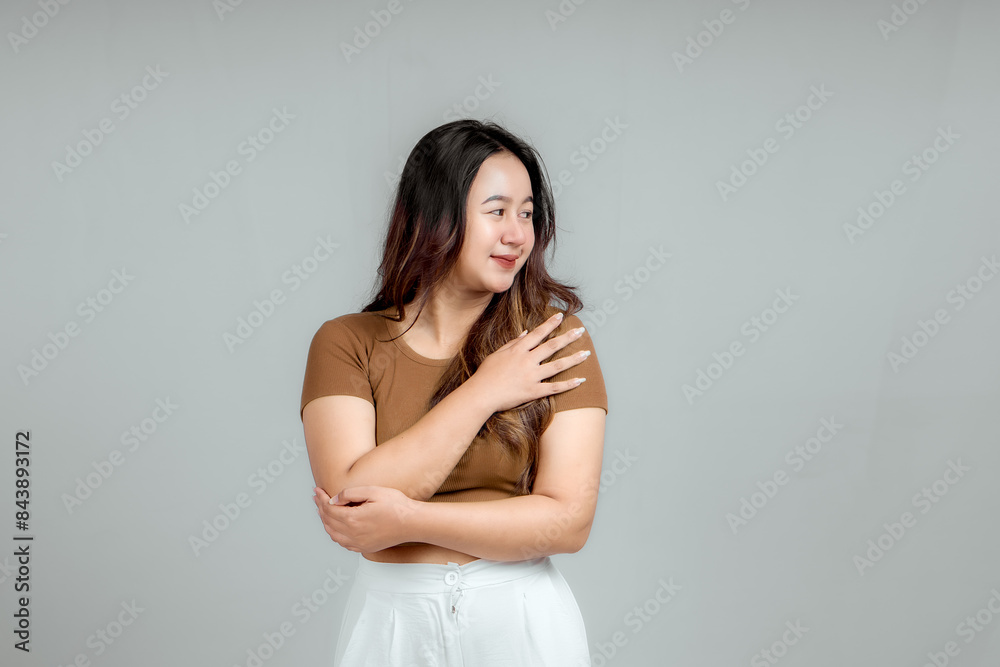 young asian woman smiling happily saying thank you, holding hands with grateful heart, expressing gratitude young asian woman smiling happily saying thank you, holding hands with grateful heart, expressing gratitude
