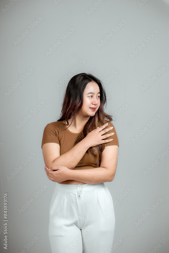 young asian woman smiling happily saying thank you young asian woman smiling happily saying thank you