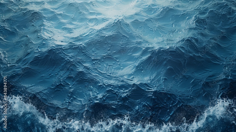 The image is of a large body of water with waves crashing against the shore The image is of a large body of water with waves crashing against the shore