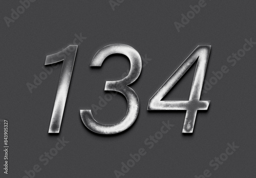 Chrome metal 3D number design of 134 on grey background.