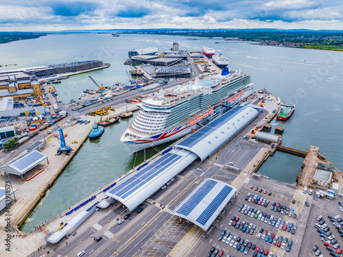 Aerial shot of Cruise Ship at Southampton Dock QE2 Terminal on a cloudy day photo